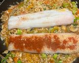 A picture of step 6 of One Pot Steamed White Fish and Savory Rice with Roasted Garlic and Tomato Sauce.