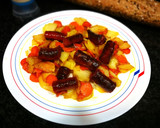 Foto del paso 5 de la receta: Chistorra con patata y zanahoria al miel de romero