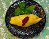 A picture of step 5 of Omu Sandwich (Sandwich wrapped with egg fry).