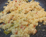 Foto del paso 5 de la receta: Revuelto de merluza con pimientos y patata