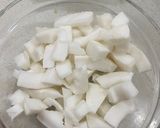 A picture of step 1 of Coconut rice.