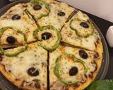صورة لخطوة 13 من وصفة بيتزا 🍕 ولااااااطيب