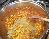 A picture of step 6 of Thai style salmon chowder.