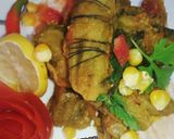 A picture of step 4 of Qeema bhare karelay.