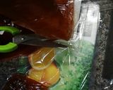 A picture of step 2 of Qamar Al din orange juice.