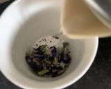 A picture of step 1 of Magic butterfly Mocktail.