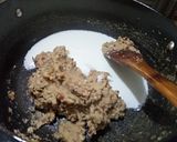A picture of step 7 of Nawabi paneer veg anda curry.