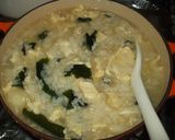 A picture of step 6 of Staff Meal Rice Porridge with Wakame and Egg.