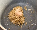 A picture of step 2 of Quinoa and Cheese Egg Poppers.