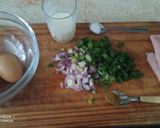 Foto del paso 1 de la receta: #mercado Rolls de tortilla y jamón rellena cebollas de verdeo