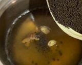 A picture of step 2 of Jaggery Tea.