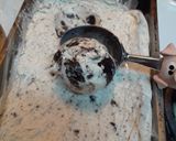A picture of step 4 of No Churn Cookies and Cream Ice Cream.