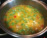 Foto del paso 5 de la receta Arroz caldoso con conejo y verduras al cúrcuma de mi madre