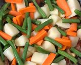 A picture of step 6 of Masala Pulao (Vegetable Pulao).