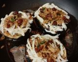 A picture of step 8 of Cheesy Kidney Beans Rice Stuffed Eggplant.
