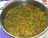 Foto del paso 5 de la receta: Arroz con guisantes y jamón