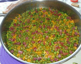 Foto del paso 5 de la receta: Arroz con guisantes y jamón