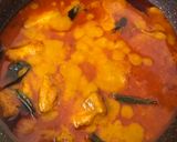 A picture of step 14 of Basa Coconut Fish Curry.