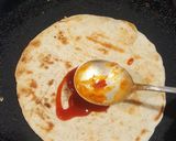 A picture of step 2 of Naan pizza.