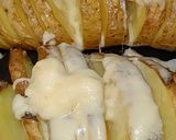 Foto del paso 3 de la receta: Papas al horno con cáscara y queso fundido