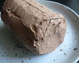 A picture of step 4 of Marie Biscuits Log Cake.