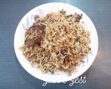 A picture of step 9 of Hyderabadi Kachchi Aqhni Chicken Dum Biryani.