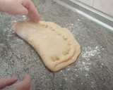 Foto del paso 3 de la receta: Buñuelos de masa madre rellenos con crema pastelera