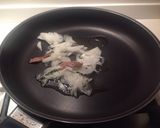 Foto del passaggio 2 della ricetta Entrecôte di Scottona con pepe rosa e riduzione di chianti e miele, e polentina con peperoni