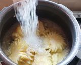 A picture of step 2 of STEWED PINEAPPLE 🍍 RINGS.