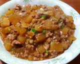 A picture of step 3 of Braised daikon and minced pork.