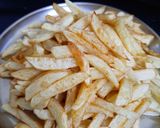 A picture of step 2 of Masala french fries.
