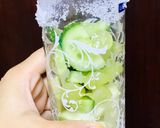 A picture of step 1 of Mixed fruit cooler with chunks of cucumber.