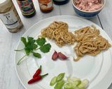 A picture of step 1 of Thai style egg noodles stir-fry served with fried egg.