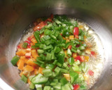 Foto del paso 4 de la receta: Pulpitos en salsa de tomates y pimientos