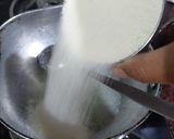 A picture of step 1 of Mava Suji halwa.