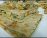 A picture of step 11 of Breakfast quesadilla||Stuffed Tortilla||Tortilla egg and cheese.