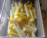 Foto del paso 2 de la receta: Papas fritas triple cocción con cheddar y panceta