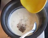 A picture of step 1 of Moong Dal Halwa Cigars dipped in Shaahi Rabdi.