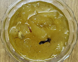 A picture of step 5 of Raw mango murabba with string candy.