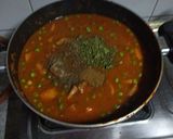 A picture of step 14 of Aloo Matar Curry.