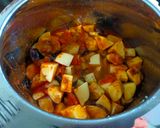 A picture of step 4 of Potato-Brinjal Curry.