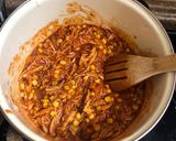 Foto del paso 3 de la receta: Tostadas de tinga