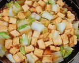 Foto langkah ke 5 dari resep Tumis sawi dan tahu putih.