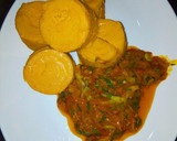 A picture of step 6 of Moin moin with palm oil sauce.