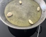 A picture of step 1 of Paella Rice with Rabbit.