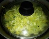 A picture of step 5 of Cabbage thoran kerala style.