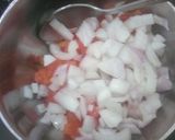 A picture of step 10 of Tomato Bhajia Katoori Chaat.