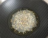 A picture of step 5 of Capsicum Tomato Rice.