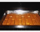 A picture of step 1 of Cheesy Fish Finger and chips bake.