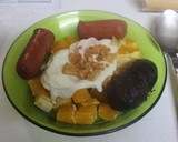 Foto del paso 9 de la receta: Huevos fritos con naranja y embutidos